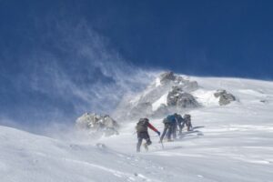 mountain climbers in snow